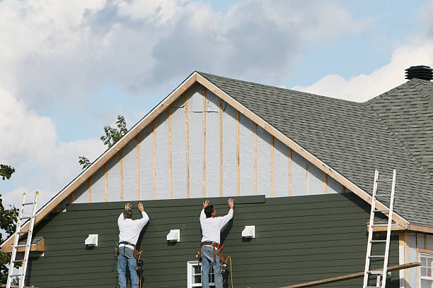 Professional Siding Installation technician working in Pisgah Forest, NC